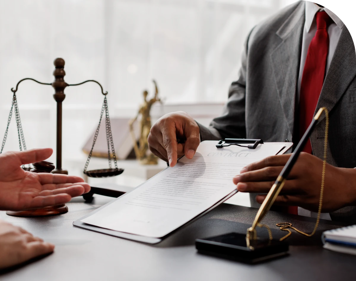 Lawyer discussing contract with a client.