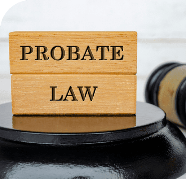 Probate law blocks on black pedestal.